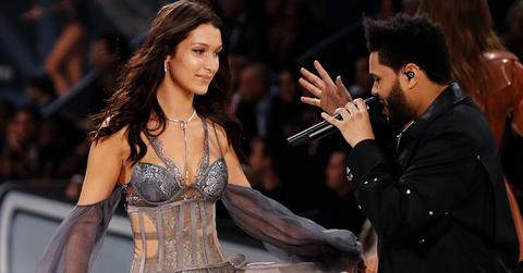 The strange moment†as Bella Hadid gets brushed off by her ex bf The Weeknd when she tries to touch him as she’s walking by him at the 2016 Victoria’s Secret Fashion Show in Paris, France