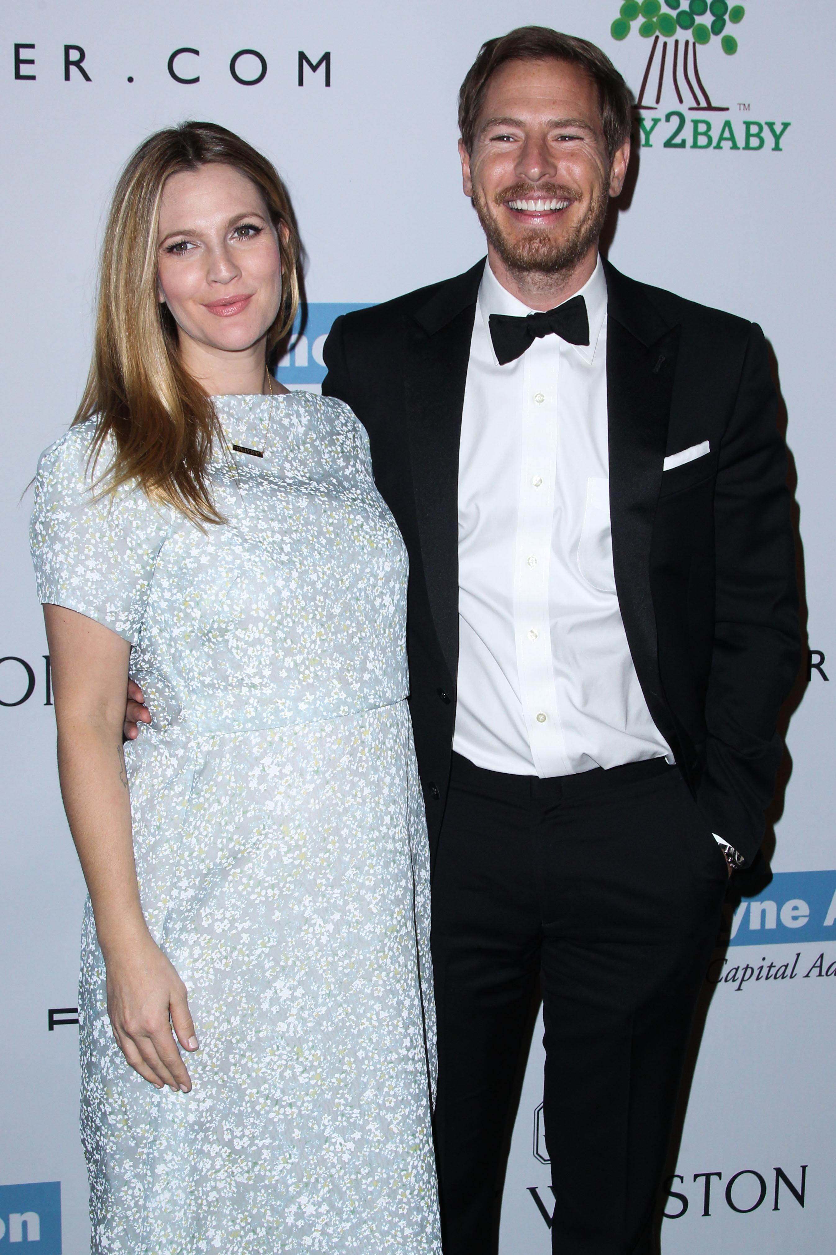 Drew Barrymore and husband Will Kopelman arrive at the 2nd Annual Baby2Baby Gala