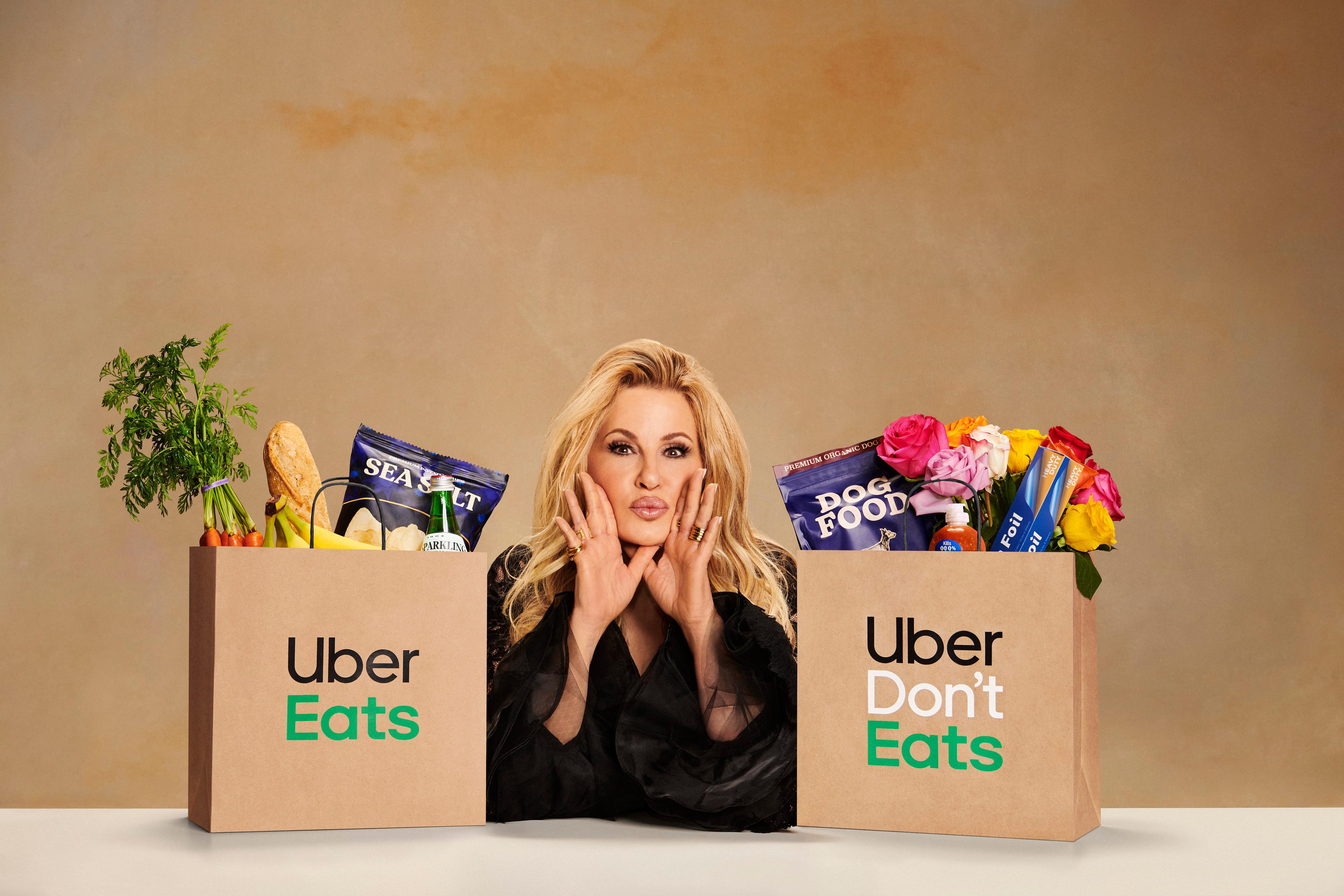 uber eats super bowl_ jennifer coolidge with bags