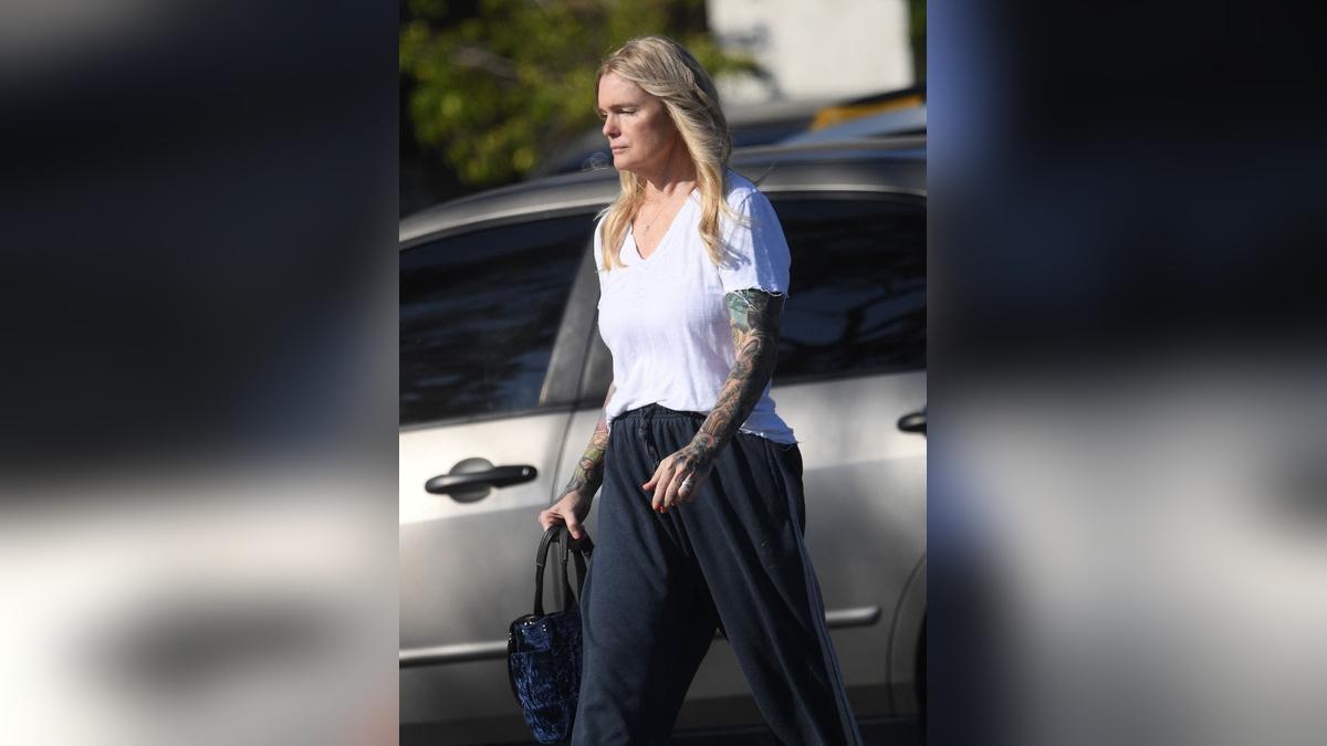 Photo of Erica Eleniak has covered her body in tattoos since leaving the beach TV show.