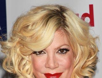 Tori spelling celeb bio headshots.jpg