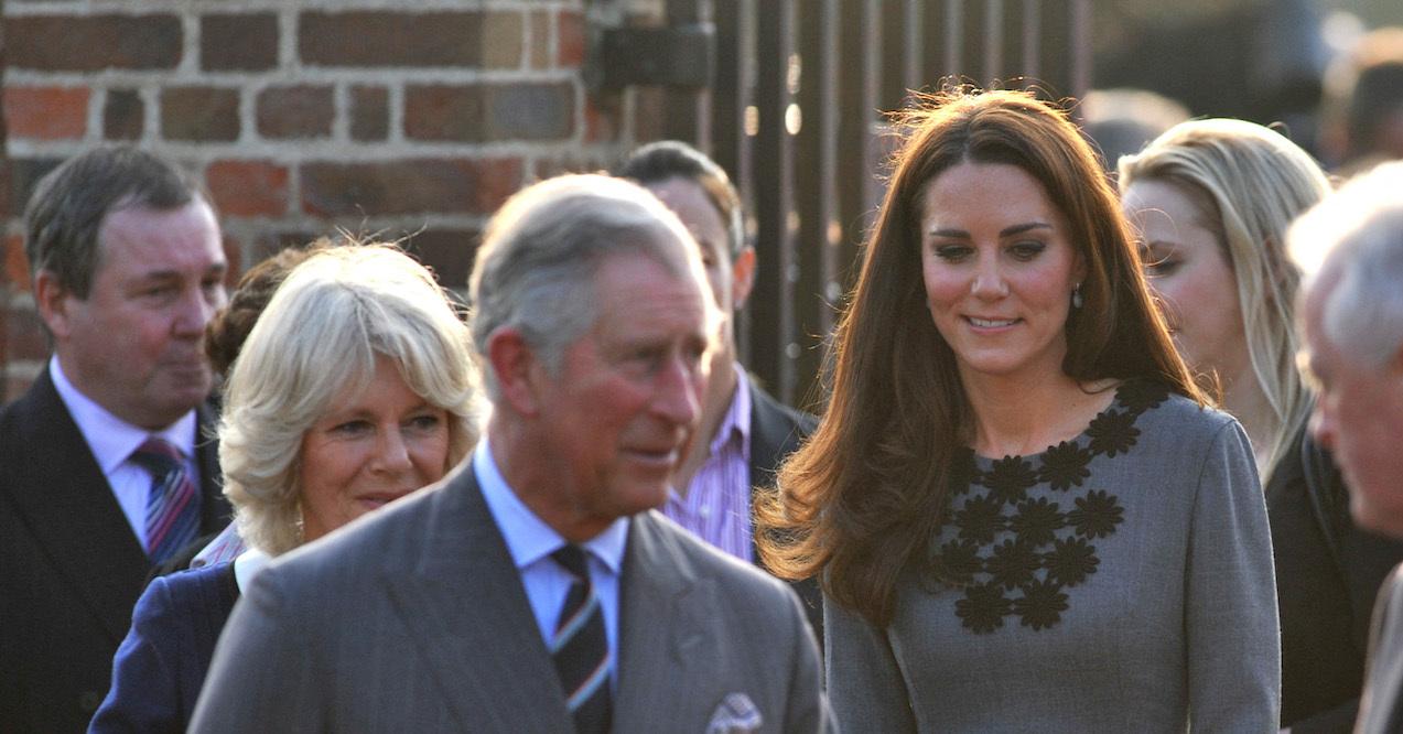 kate middleton king charles leaning each other