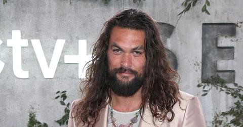 Jason Momoa Wearing A Pink Outfit