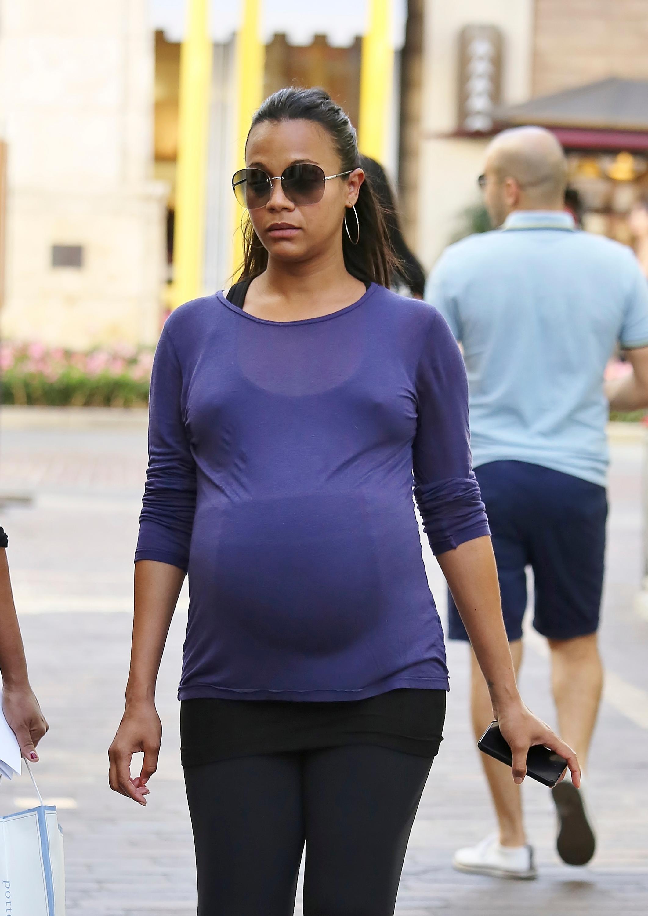 Pregnant Zoe Saldana shops at The Grove in West Hollywood, California