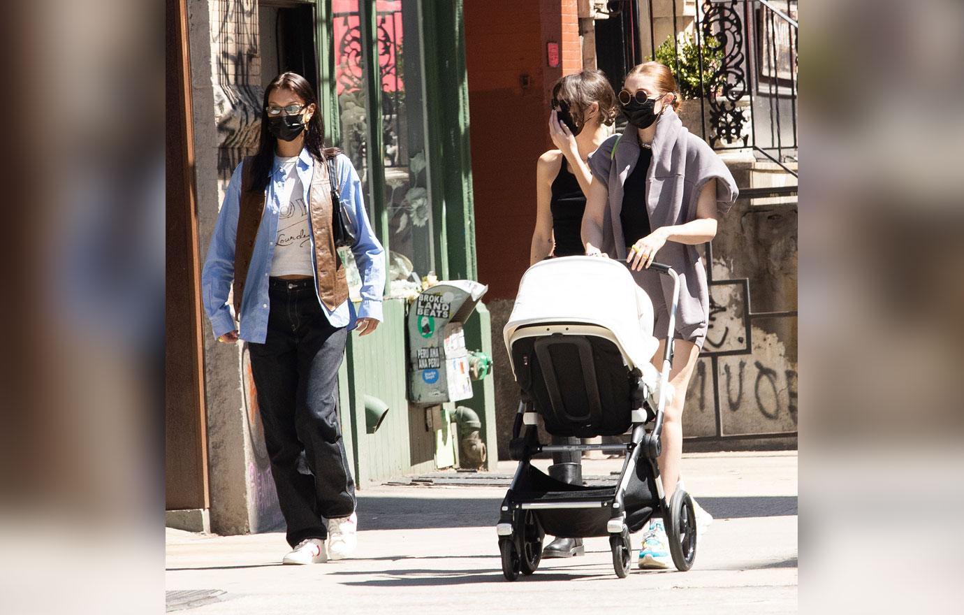 bella hadid and gigi hadid enjoy a leisurely stroll with gigi's daughter  khai in new york city-201022_3