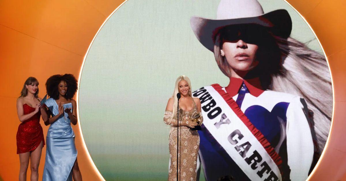 image of Beyoncé won the Grammy for Best Country Album and accepted the award from Taylor Swift.