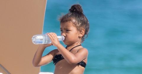 Kim Kardashian’s daughter North West takes to the beach in Miami.