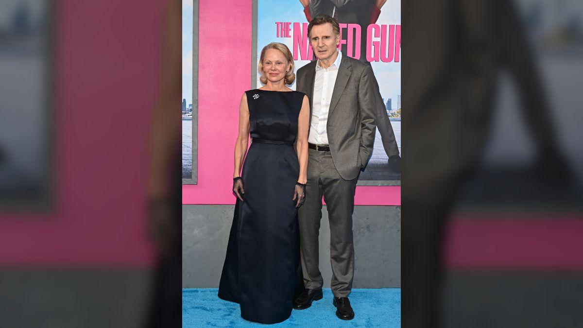 Image of Liam Neeson said he was 'madly in love' with Pamela Anderson.