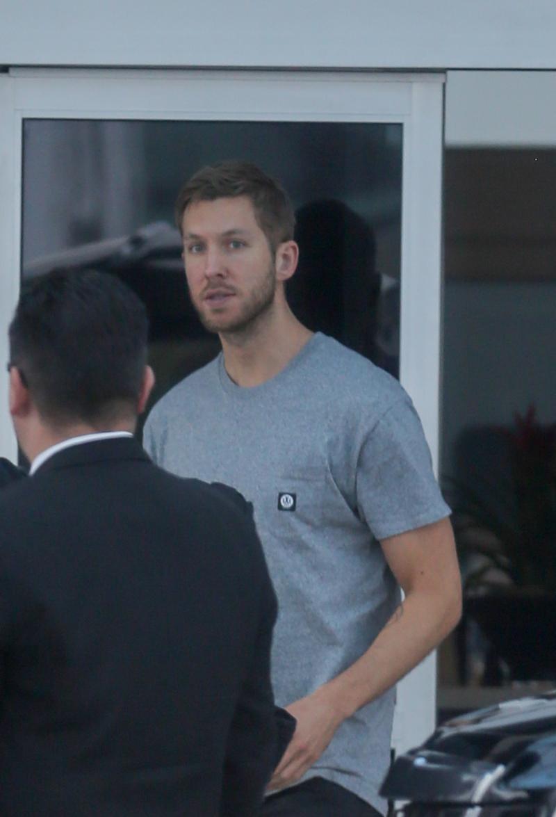 EXCLUSIVE: **PREMIUM RATES APPLY**Calvin Harris arrives at LAX with what appears to be a bruised ear