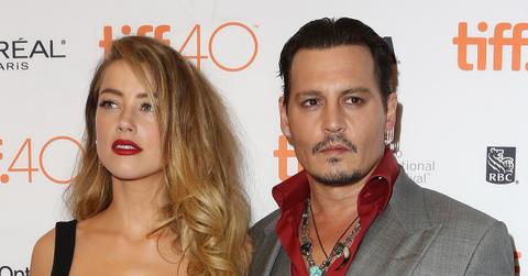 amber heard johnny depp inks book deal