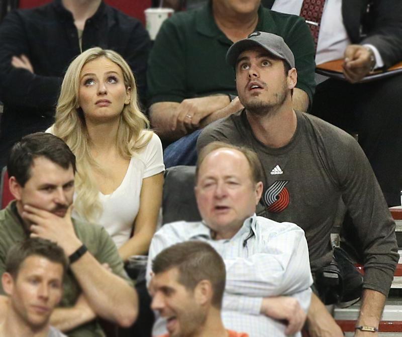 EXCLUSIVE: *PREMIUM EXCLUSIVE RATES APPLY* Ben Higgins and Lauren Bushnell watch the Portland Trail Blazers v Oklahoma Thunder NBA game in her hometown