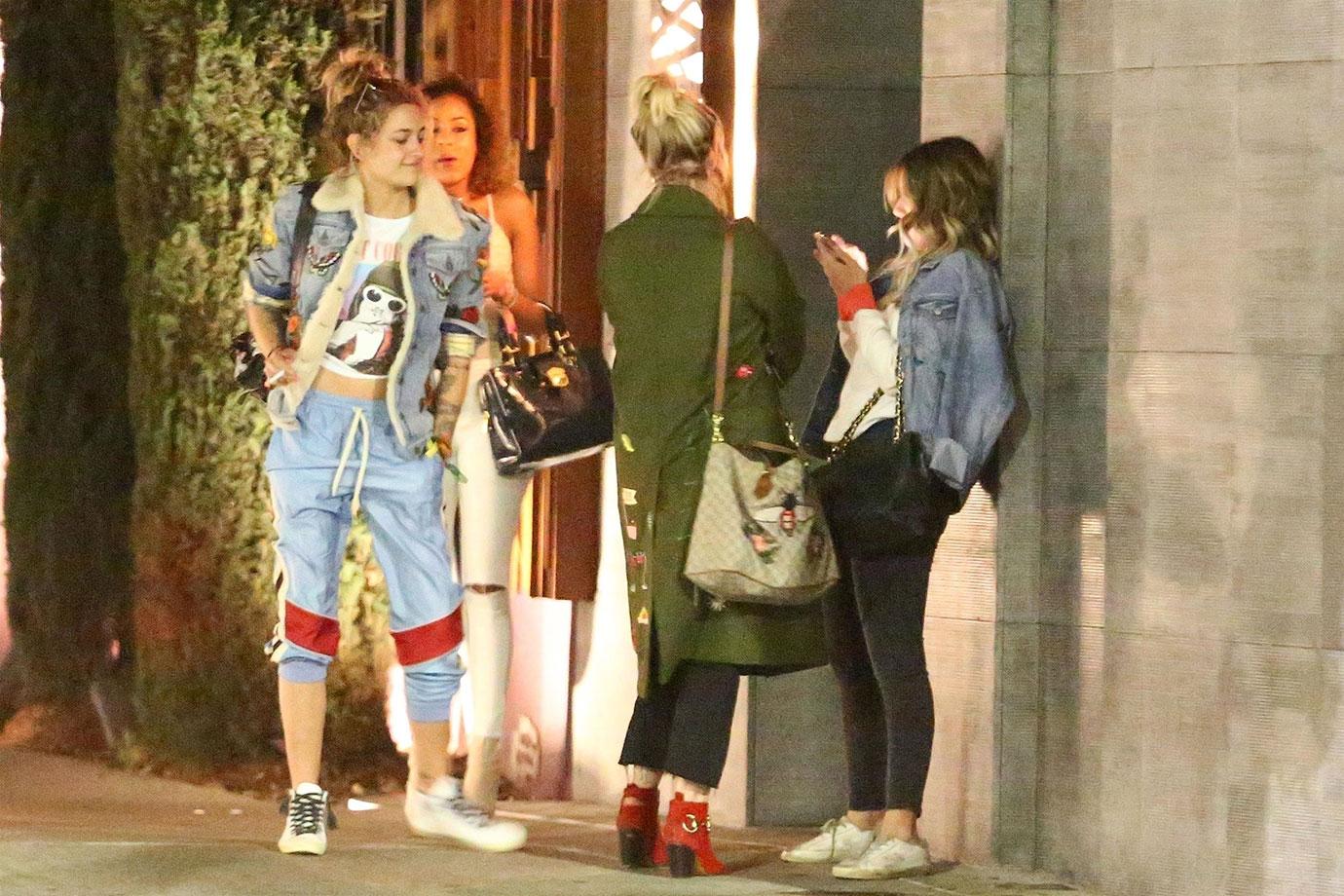 *EXCLUSIVE* Paris Jackson kicks her friend in the butt on the way out of Nobu in Malibu