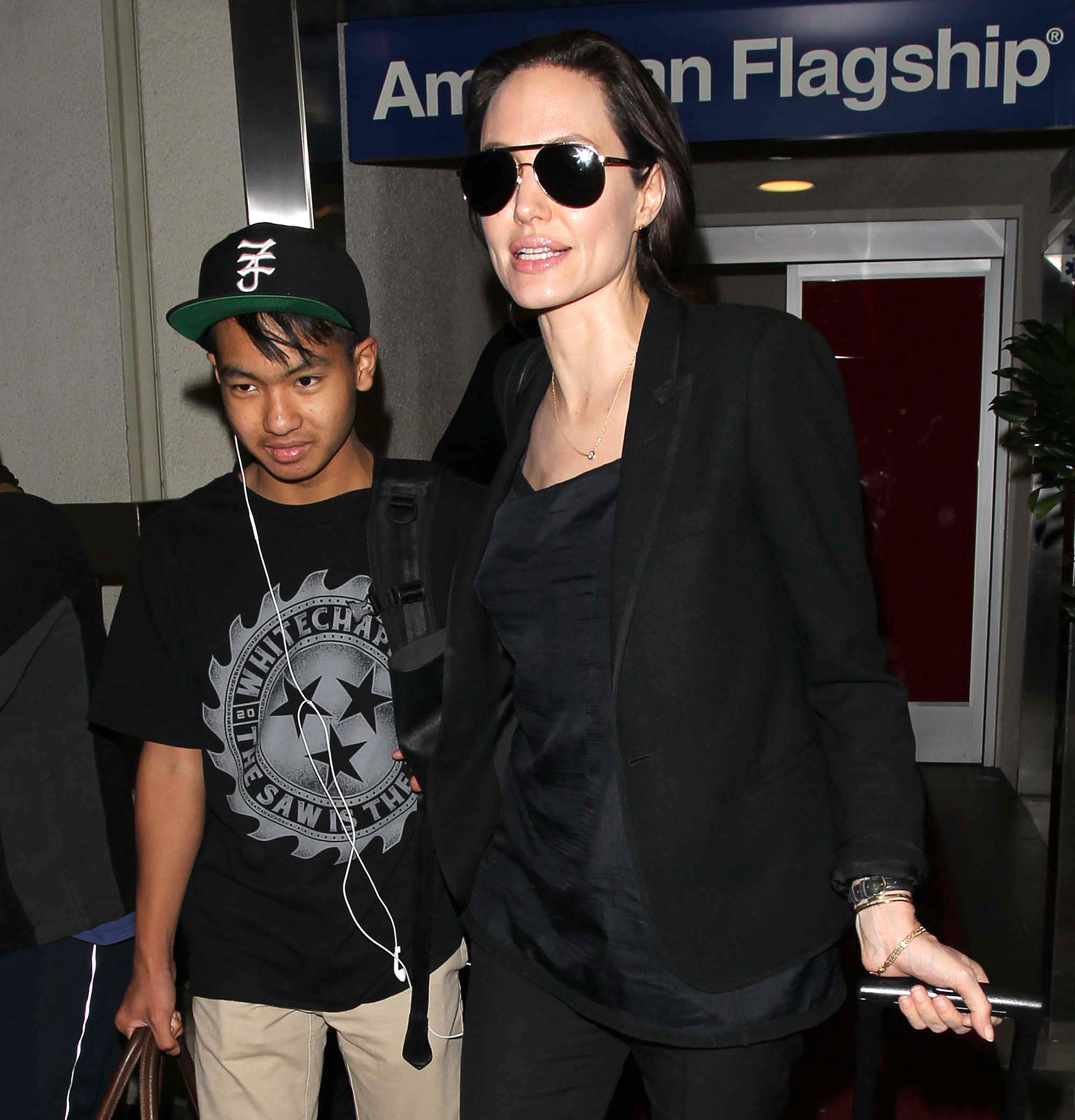 Angelina Jolie and her son Pax were seen arriving at LAX on a flight from New York City.