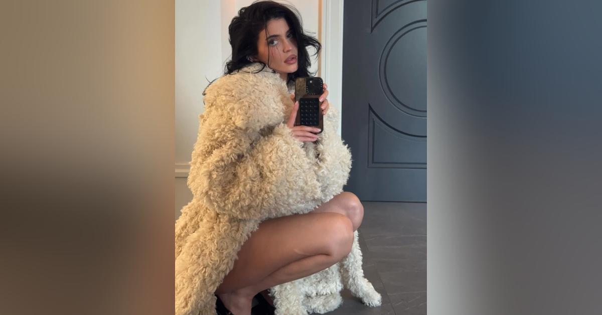 kylie jenner ditches pants shows legs coat khy clothing collection photos