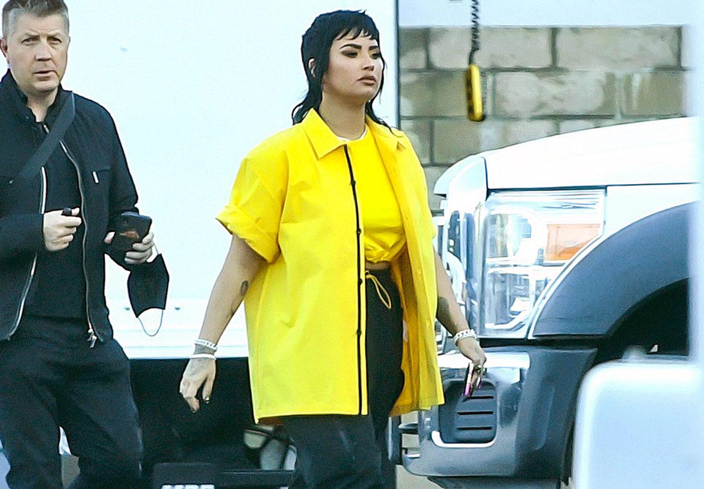 demi lovato sports a funky mullet while on the set of a music video with rapper g eazy in los angeles