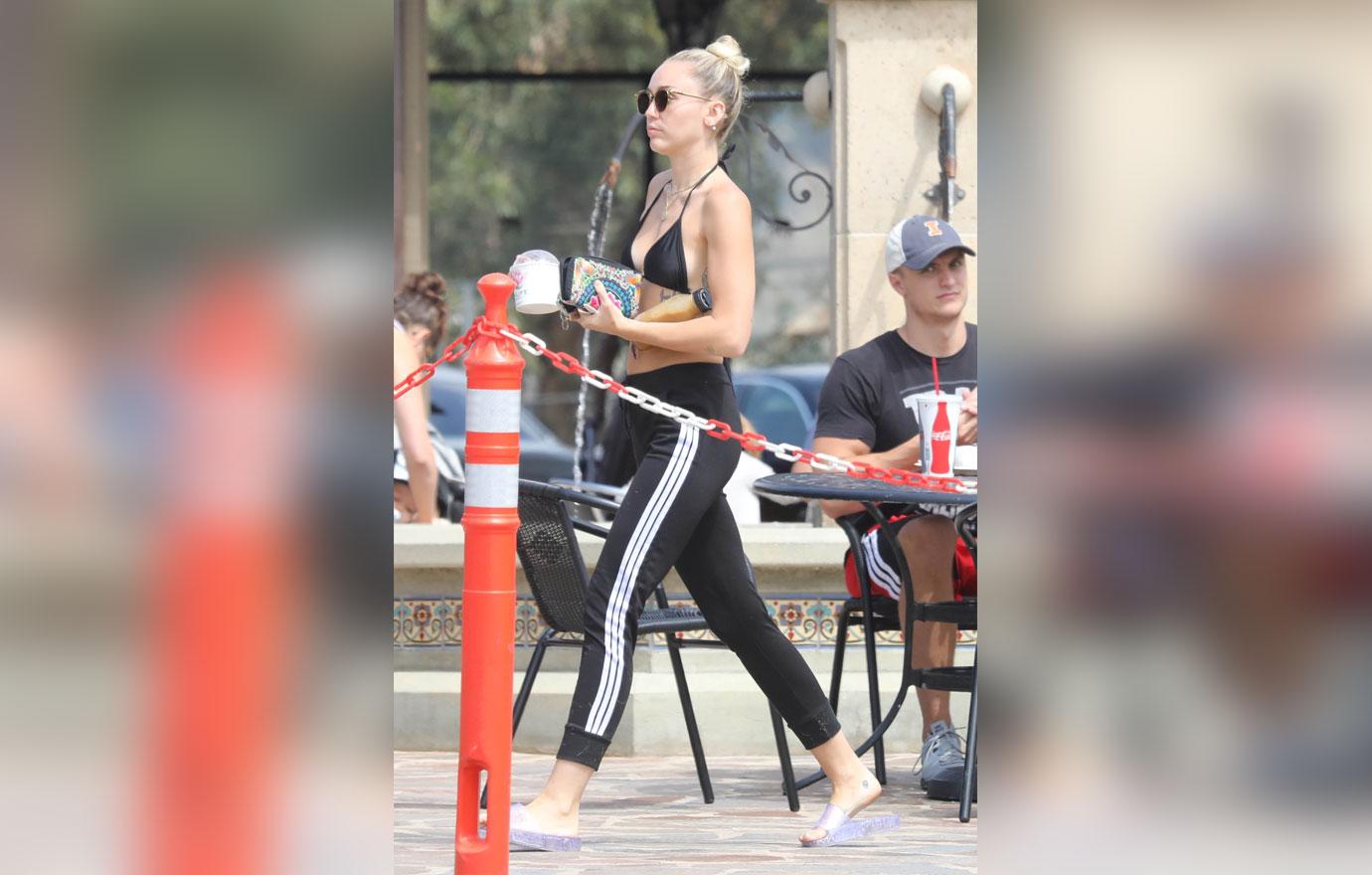 Miley Cyrus Wears Skimpy Bikini Top While Running Errands In Malibu