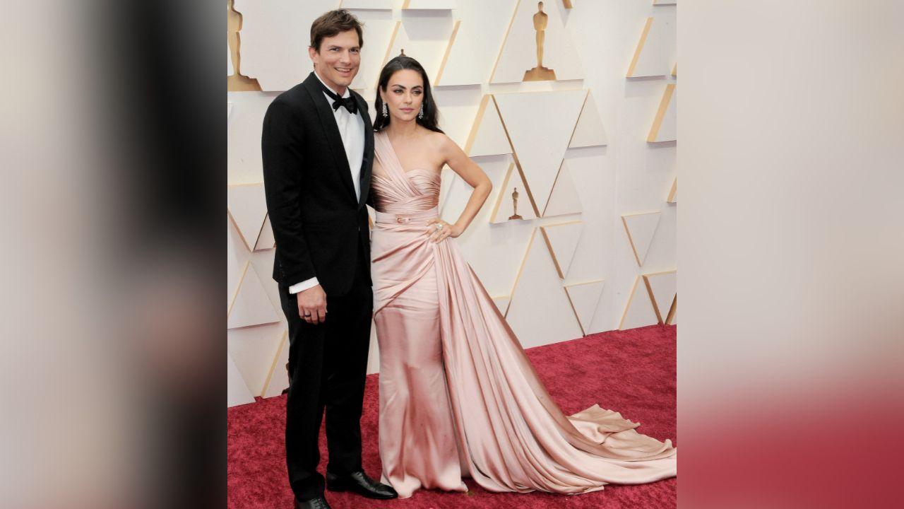 image of Ashton Kutcher supported Mila Kunis backstage during her 'Live' guest-host appearance.