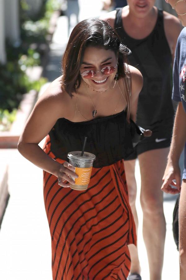 Vanessa Hudgens laughs it up with friends while shopping