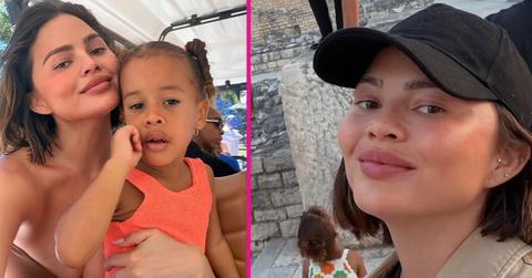 Image of Chrissy Teigen showed off her cleavage while on vacation with her family.
