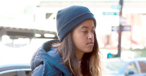Malia Obama arrives to work in New York in a heavy blue coat