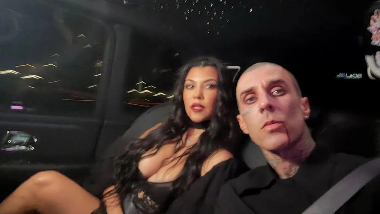 image of The pair posed for a cute photo in the car.