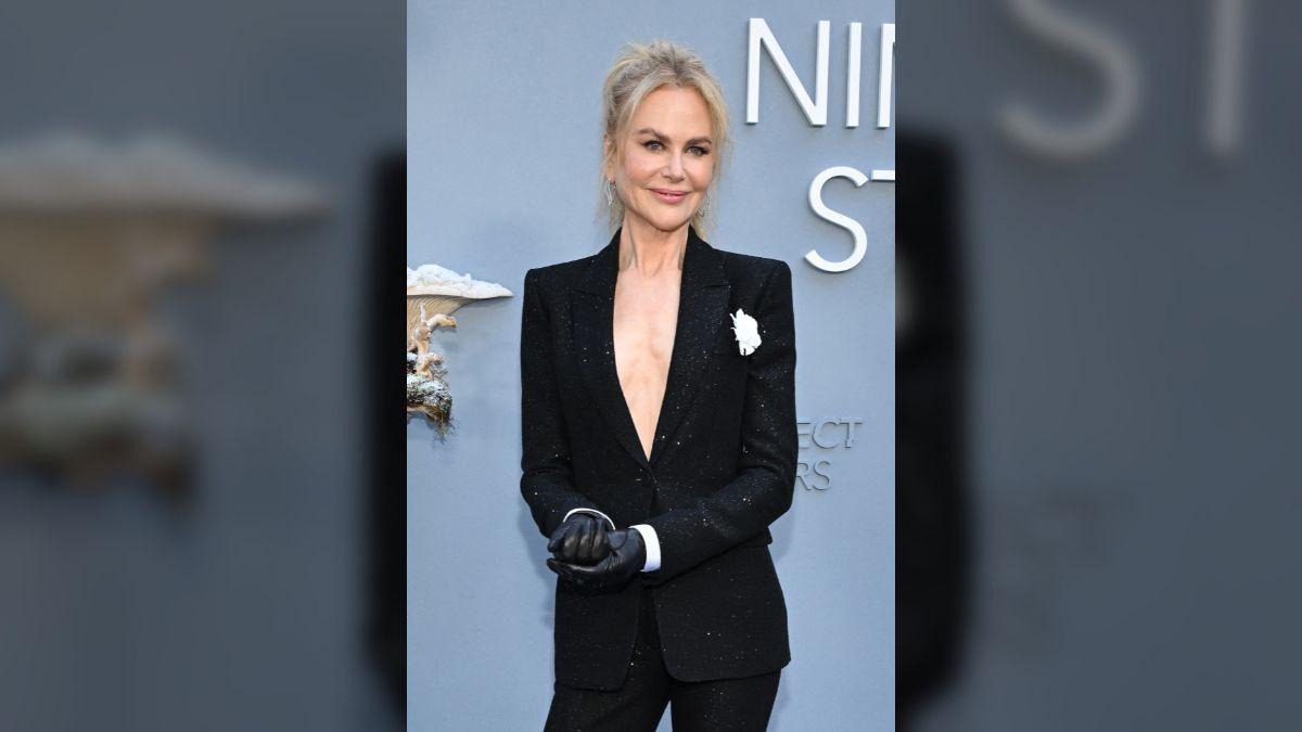 Image of Nicole Kidman finds refuge in her work, a source said.