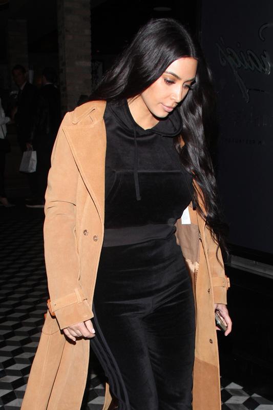 Kim Kardashian Smiles As She Leaves Restaurant In West Hollywood