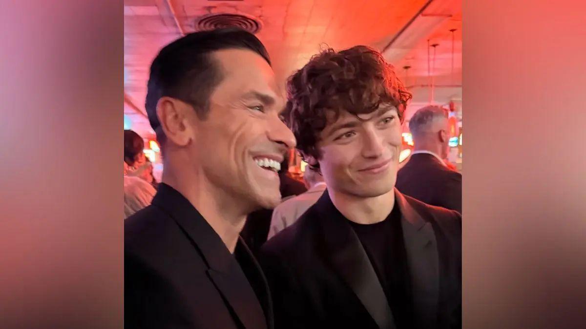 Image of Kelly Ripa praised both Mark Consuelos and son Joaquin's Broadway successes in a sweet family moment on 'Live.'