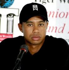 2009__12__tigerwoods9 223×225.jpg