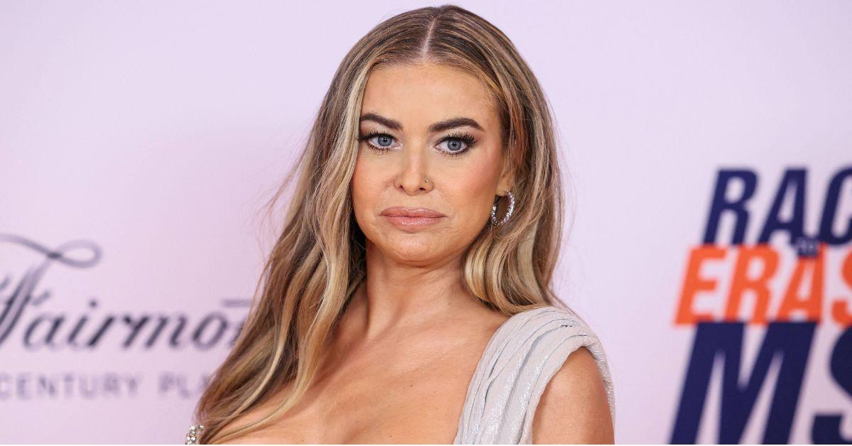 image of Carmen Electra debunked nipple piercing rumors while out in West Hollywood.