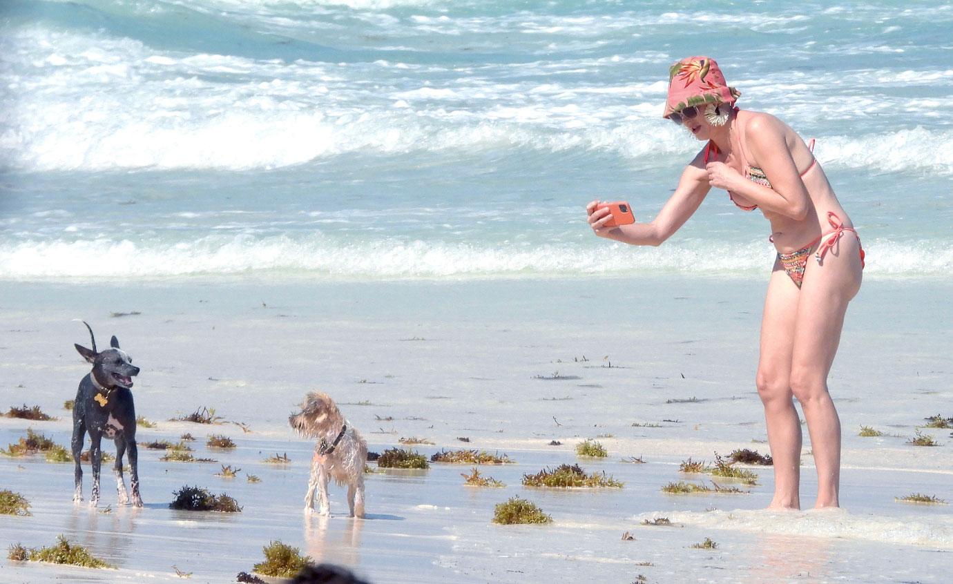 rose mcgowan hits the beach in mexico with friend