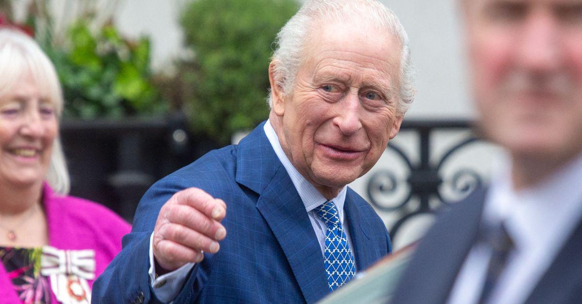 image of Kate Winslet almost showed King Charles a little too much skin.