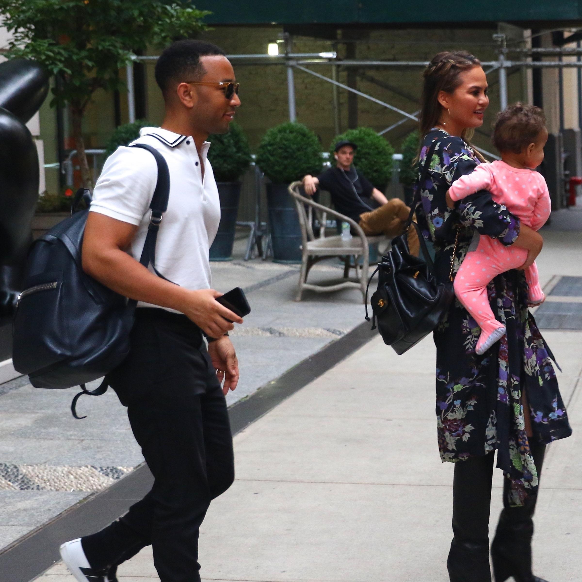 Chrissy Teigen &amp; John Legend check out of their hotel in New York