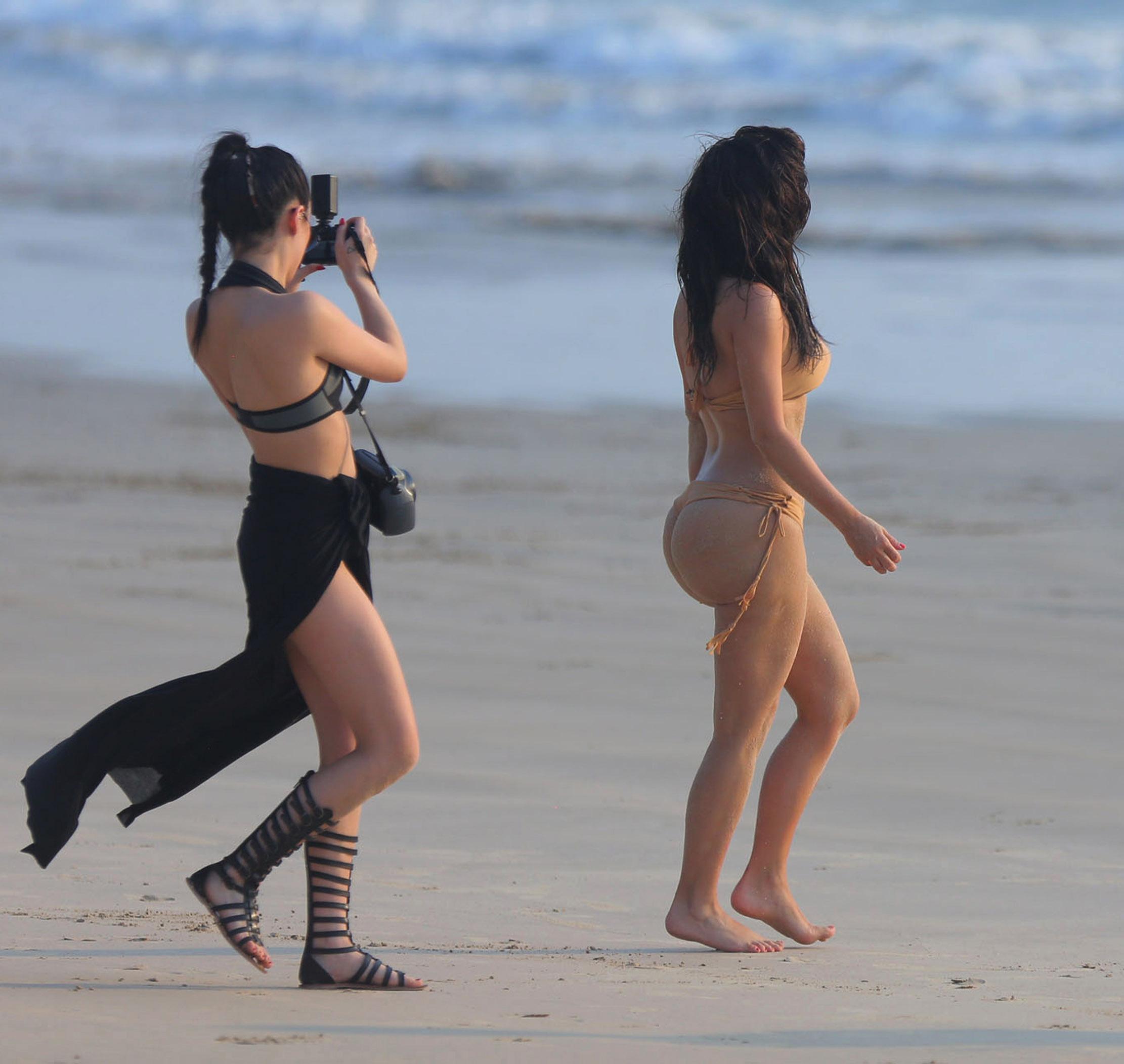 EXCLUSIVE: ***PREMIUM EXCLUSIVE***Kim Kardashian shows off her famous booty in a nude coloured bikini on a photo shoot in Thailand