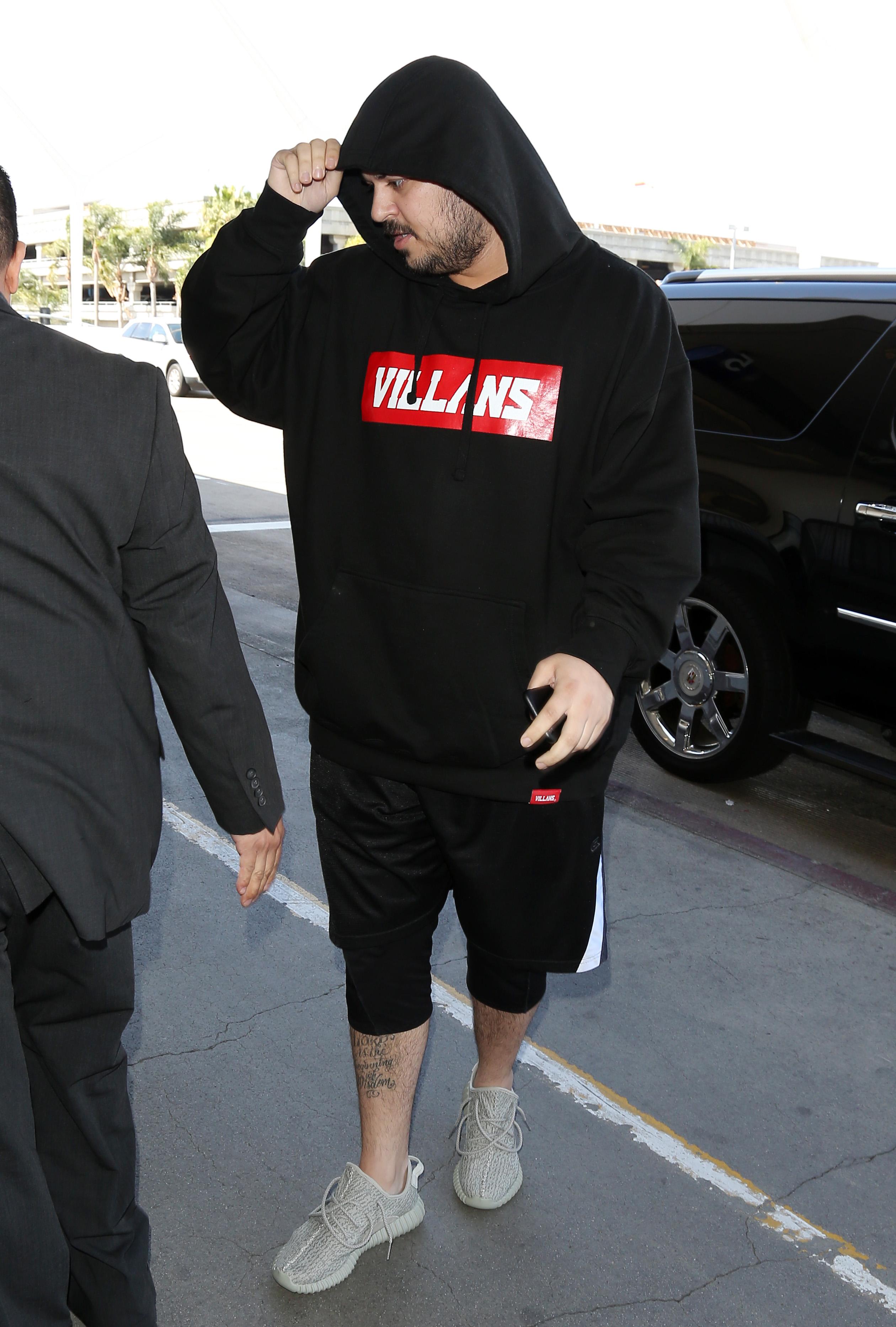 Rob Kardashian leaving LAX airport after reported split with Blac Chyna