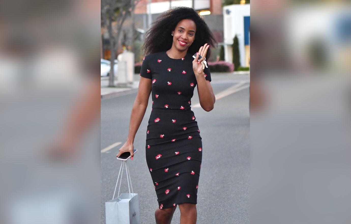 Kelly Rowland looks happy and bubbly after shopping at Neiman Marcus in Beverly Hills