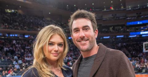 Kate Upton and boyfriend Justin Verlander sit court side at Madison Square Garden as they attend the NY Knicks game