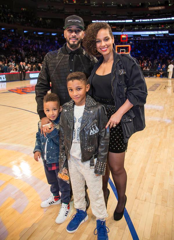 Alicia Keys and Swizz Beatz and sons attend basketball game at Madison Square Garden