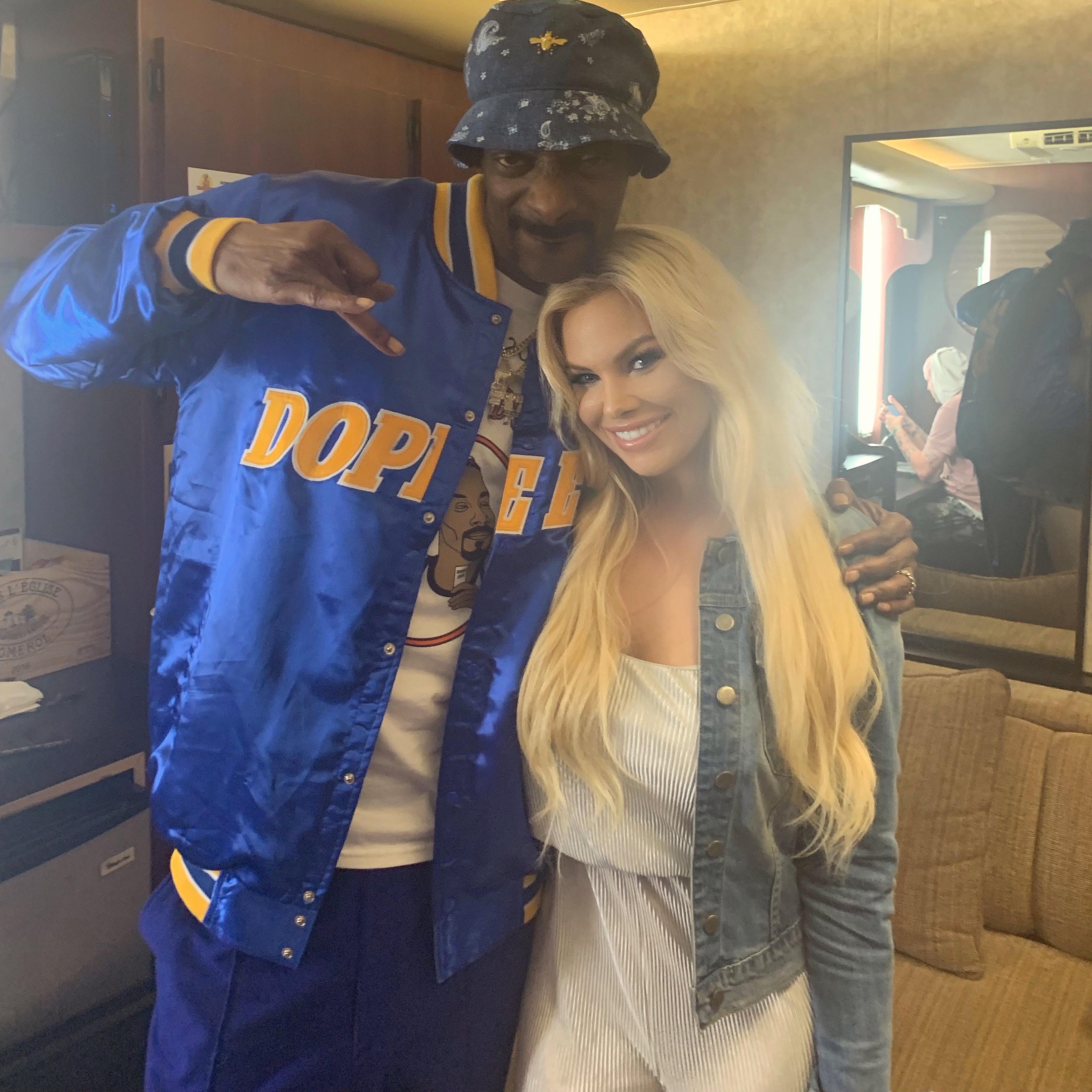 Cover model and influencer Kourtney Reppert seen hanging out backstage with Snoop Dogg and Kroq’s Weenie Roast