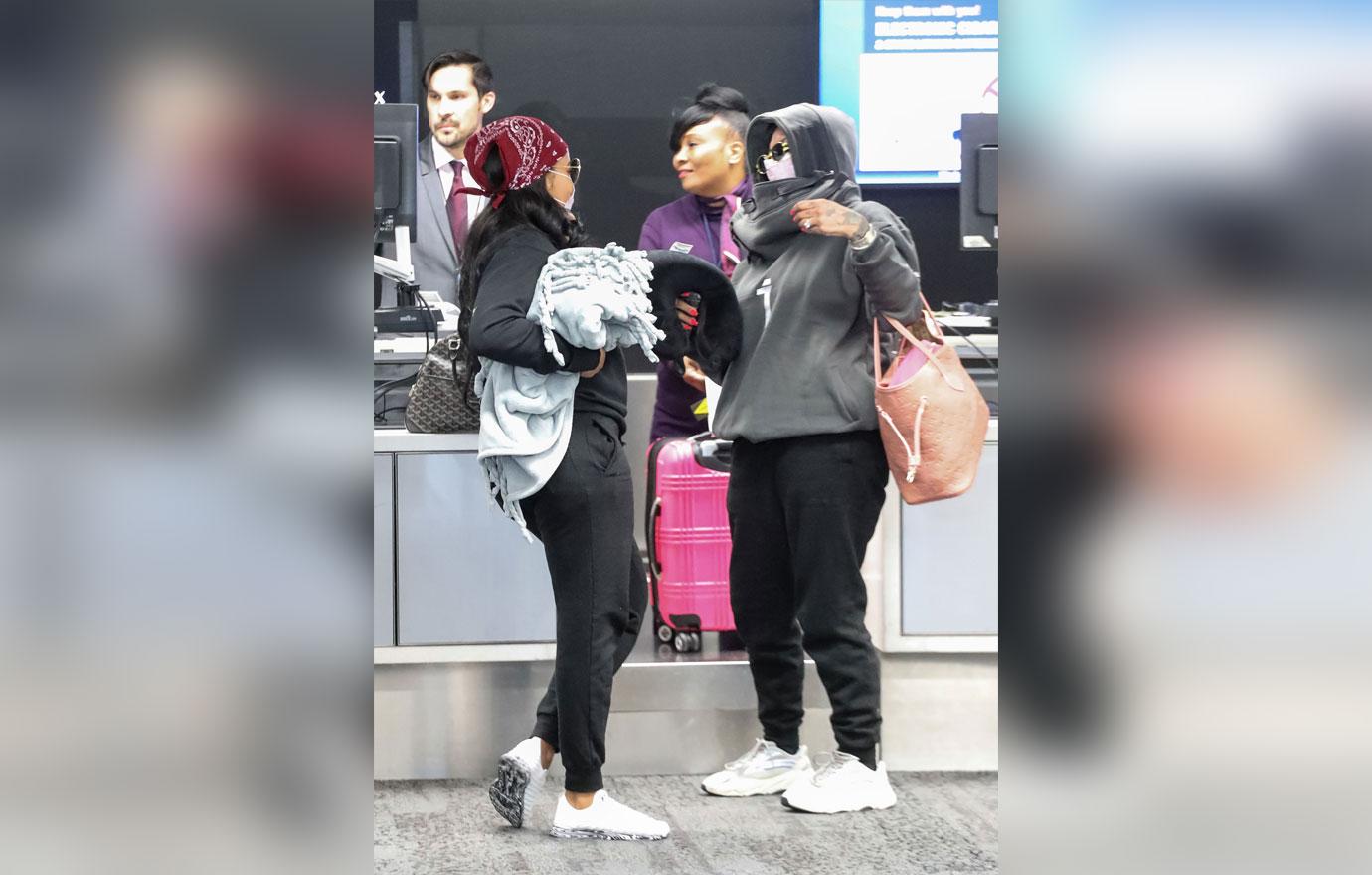 Angela Simmons Wears Face Mask At Airport Amid Coronavirus Outbreak