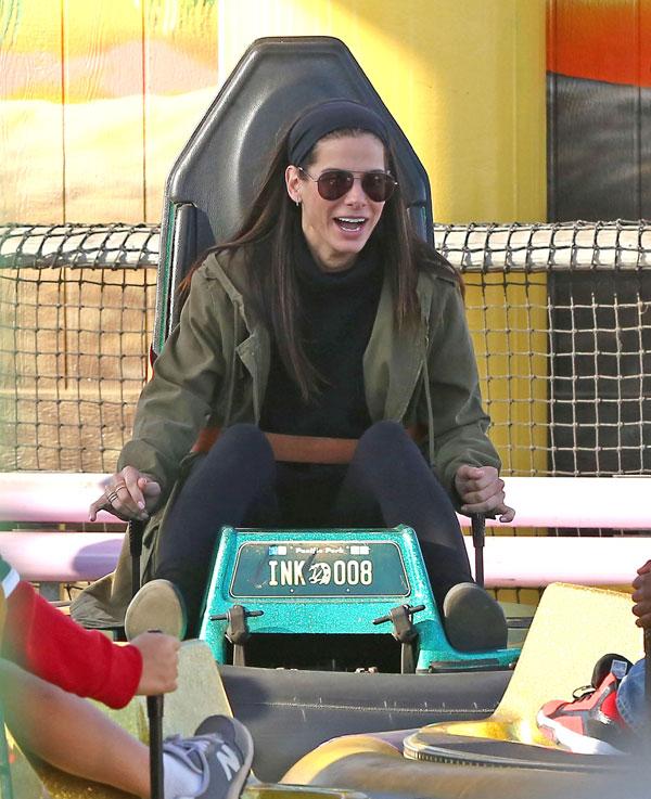 sandra bullock son louis bumper car fun