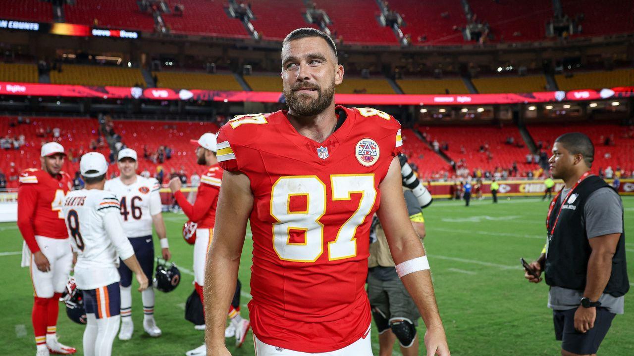 Image of Travis Kelce confirmed he went for the 'full gamut' with his wedding look, which included a custom Dior ensemble and white top hat.