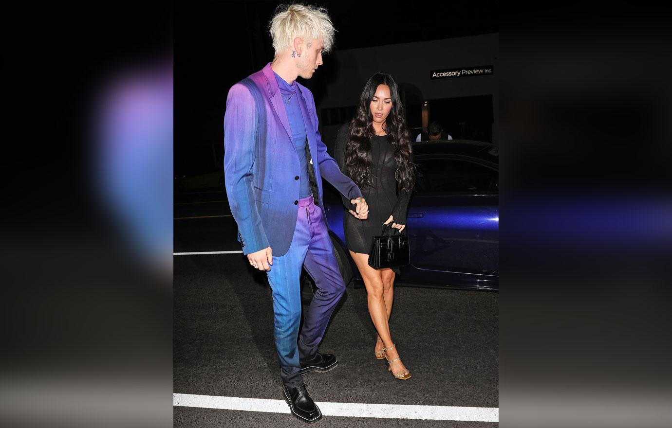 megan fox and machine gun kelly walk hand in hand as they head to the nice guy restaurant to party