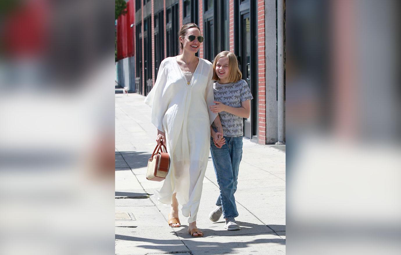 Angelina Jolie With Daughter Braless Paris