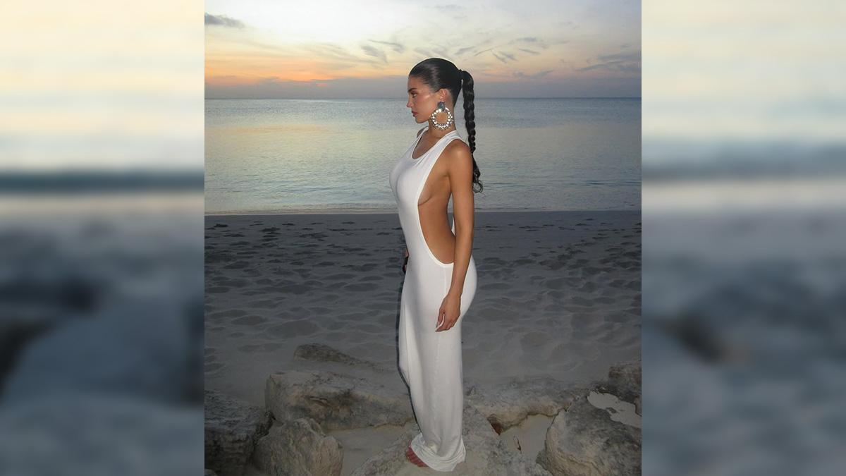 Image of Kylie Jenner posed in the stunning white dress. 