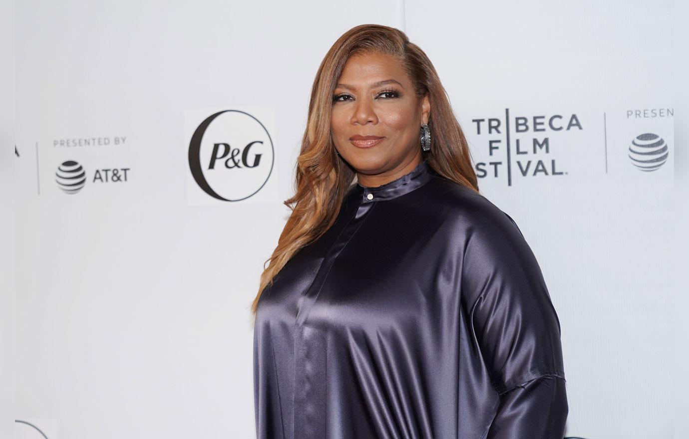 Queen Latifah Wearing Purple Blouse