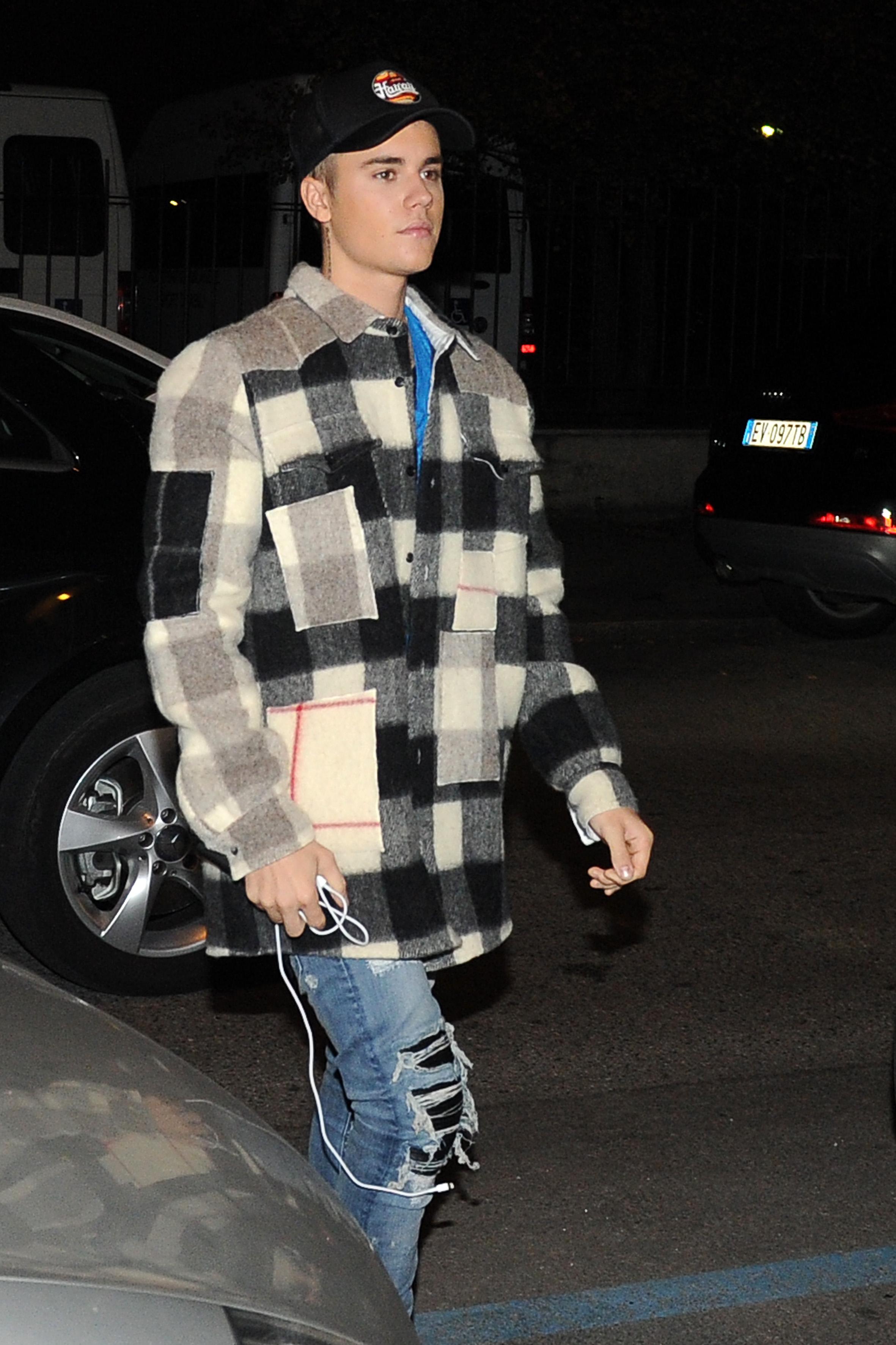 Justin Bieber arrives at a restaurant in Milan