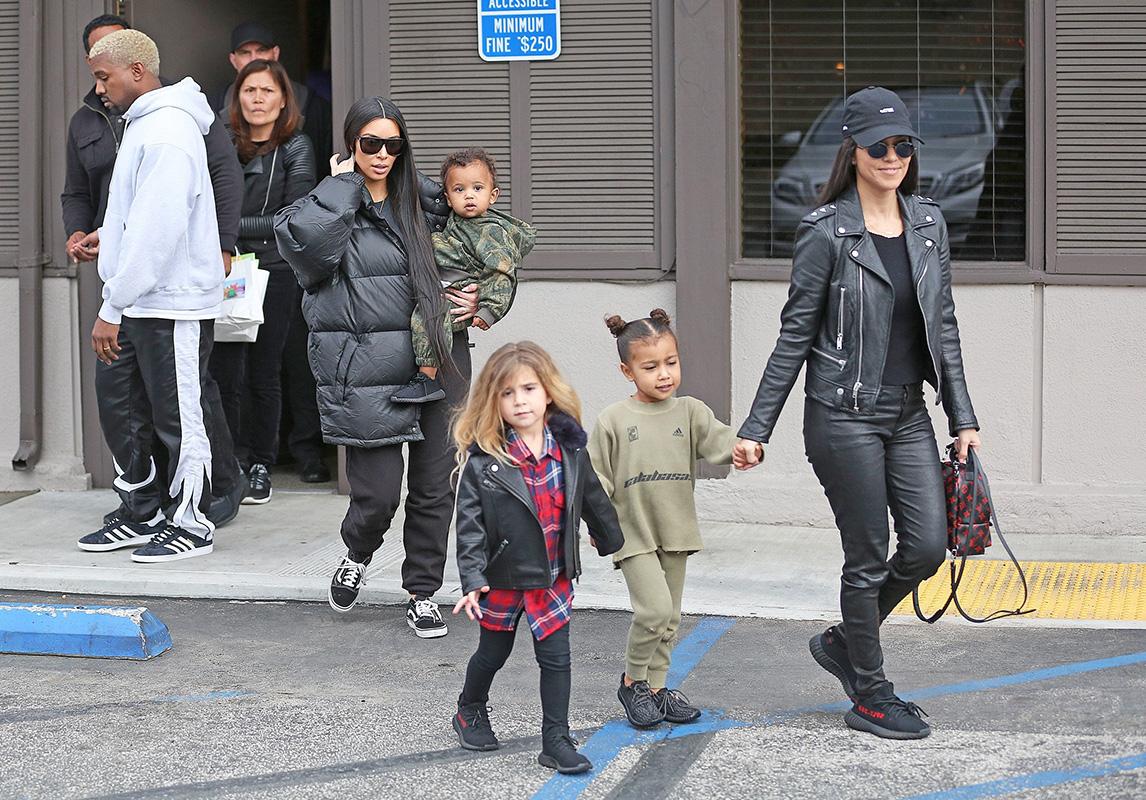 Kardashian sisters Kim and Kourtney join Kanye West and the kids for dinner