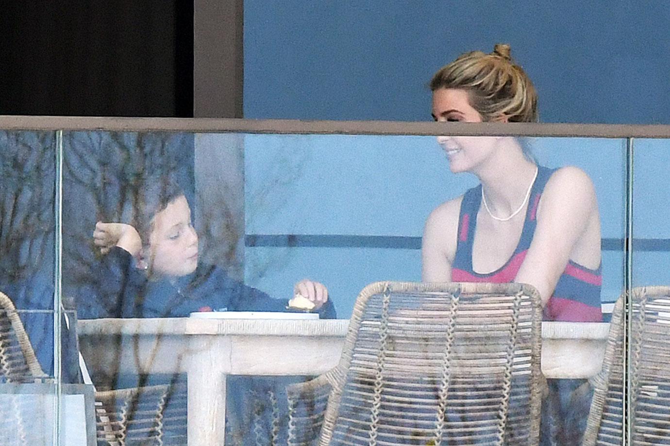 ivanka trump red and black striped dress lunch with son balcony miami