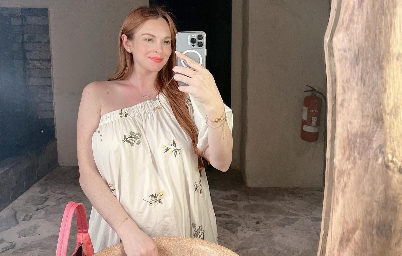 Lindsay Lohan flashes her breasts on Miami Beach in second wardrobe  malfunction of the day